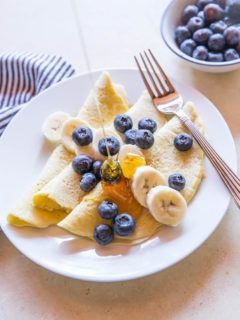 Grain-Free Paleo Crepes made with almond flour and tapioca flour - easy to prepare in your blender! | TheRoastedRoot.net #glutenfree