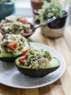 Healthy Greek Tuna Salad Stuffed Avocadosmade with fresh ingredients for a healthy lunch | TheRoastedRoot.net #keto #paleo #lowcarb