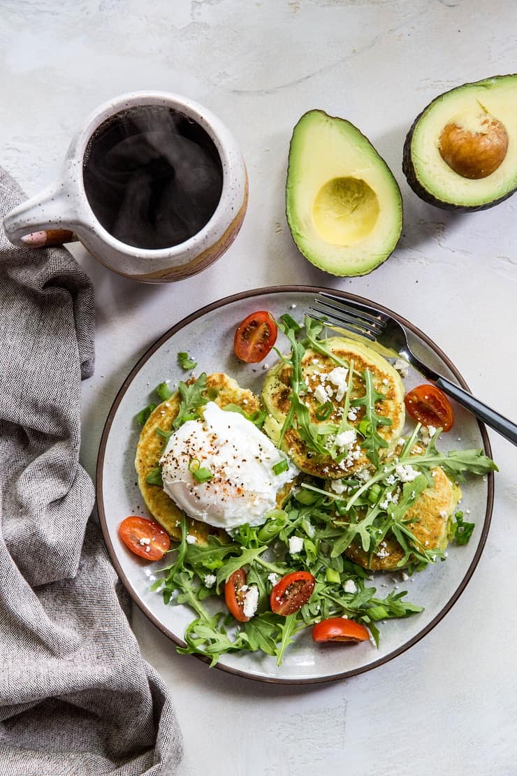 Grain-Free Avocado Pancakes - paleo pancakes made with almond flour, almond milk, eggs, and avocado - an easy and delicious savory pancake recipe | TheRoastedRoot.net #paleo