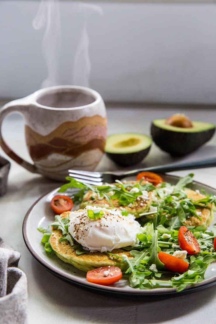 Paleo Avocado Pancakes - grain-free pancakes made with almond flour, almond milk, eggs, and avocado - an easy and delicious savory pancake recipe | TheRoastedRoot.net #paleo