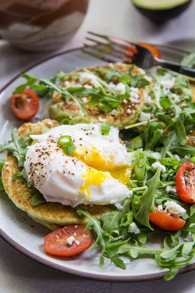 Paleo Grain-Free Avocado Pancakes - gluten-free pancakes made with almond flour, almond milk, eggs, and avocado - an easy and delicious savory pancake recipe | TheRoastedRoot.net #paleo