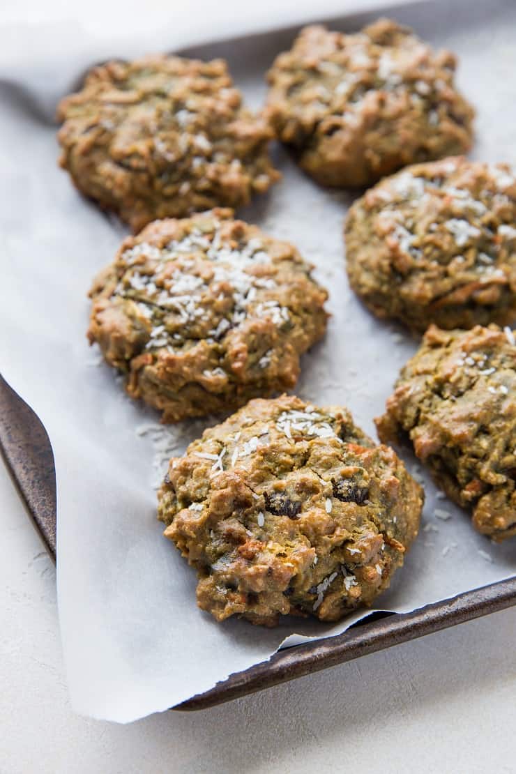 Paleo Morning Glory Cookies made with almond flour, carrots, apple, coconut, raisina, walnuts, pure maple syrup and more! A healthy dessert or breakfast. | TheRoastedRoot.net