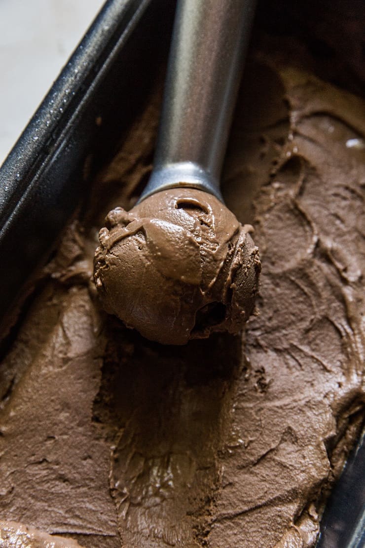 Keto Chocolate Ice Cream - paleo, vegan, dairy-free chocolate ice cream made with avocados. This easy no churn recipe only requires a blender or food processor. | TheRoastedRoot.net 
