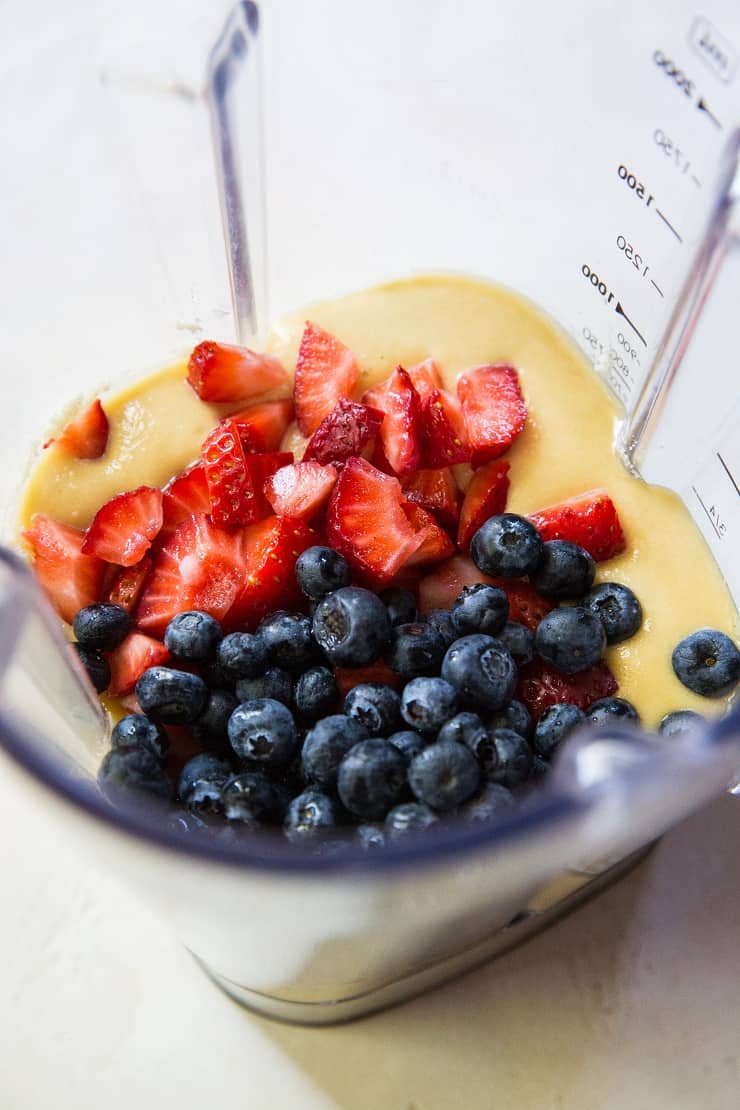 grain-free cake with strawberries and blueberries