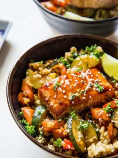 Teriyaki Salmon Bowls with teriyaki stir fry vegetables and rice - a healthy well-balanced meal that is easy to prepare. | TheRoastedRoot.net #glutenfree