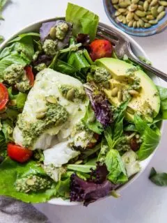 Cod Salad with Basil-Walnut Pesto, cherry tomatoes, pumpkin seeds and avocado - a low-carb, keto, paleo, whole30 dinner recipe | TheRoastedRoot.net