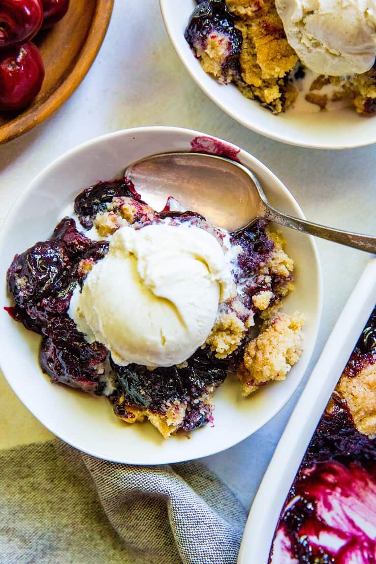 Gluten-Free Cherry Cobbler - refined sugar-free with a vegan and paleo option! An easy approach to classic delicious cherry cobbler | TheRoastedRoot.net