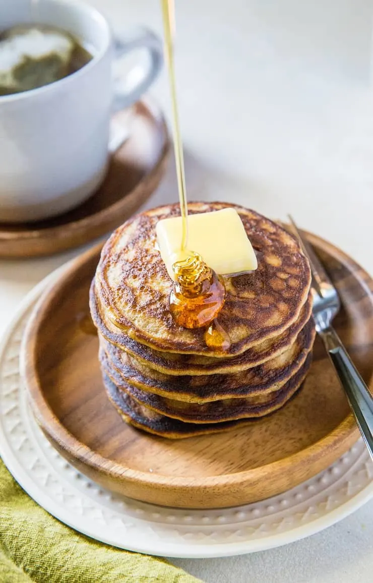 Coconut Flour Zucchini Pancakes made grain-free, refined sugar-free and healthy. An easy paleo pancake recipe made in your blender | TheRoastedRoot.net