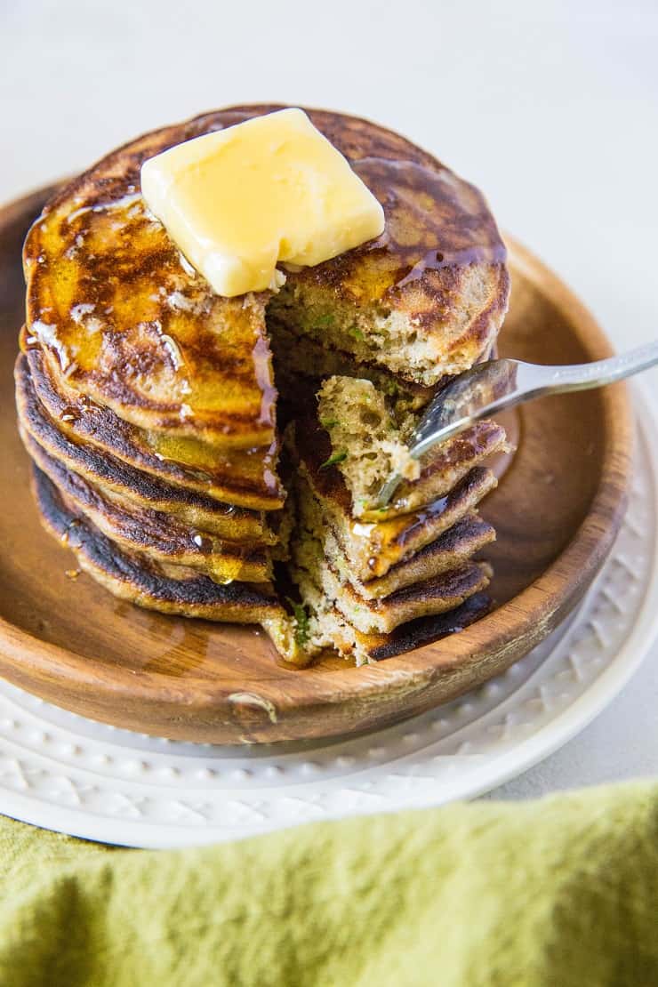 Grain-Free Coconut Flour Zucchini Pancakes - an easy paleo pancake recipe made in a blender! Fluffy, moist, delicious, healthy. | TheRoastedRoot.net #glutenfree