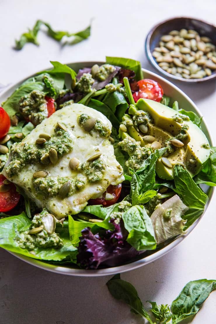 Cod Salad with Basil-Walnut Pesto, cherry tomatoes, pumpkin seeds and avocado - a low-carb, keto, paleo, whole30 dinner recipe | TheRoastedRoot.net