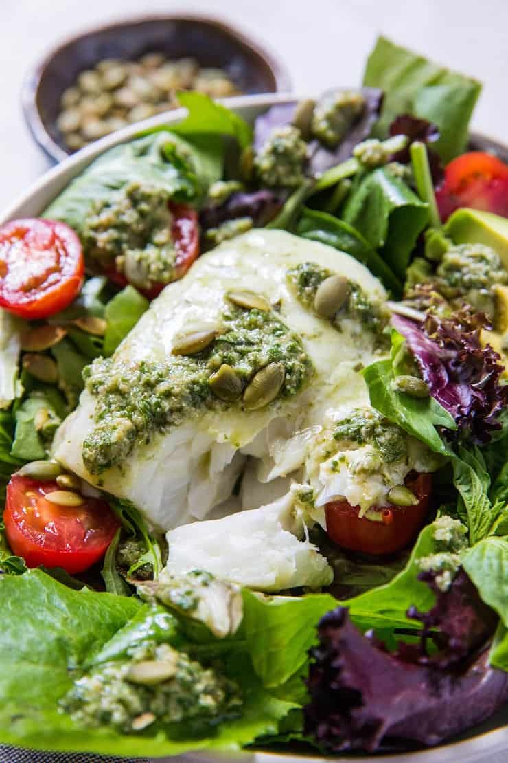 Cod Salad with Basil-Walnut Pesto, cherry tomatoes, pumpkin seeds and avocado - a low-carb, keto, paleo, whole30 dinner recipe | TheRoastedRoot.net