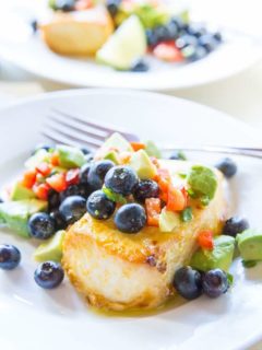 Orange Ginger Halibut with Blueberry Avocado Salsa - a baked halibut recipe that is easy to prepare and so flavorful! A healthy dinner recipe - paleo, whole30, low-carb | TheRoastedRoot.net