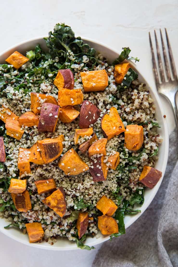 Roasted Sweet Potato Kale Salad with Quinoa, hemp seeds, and honey mustard dressing | TheRoastedRoot.net