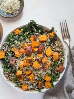 Roasted Sweet Potato Kale Salad with Quinoa, hemp seeds, and honey mustard dressing | TheRoastedRoot.net