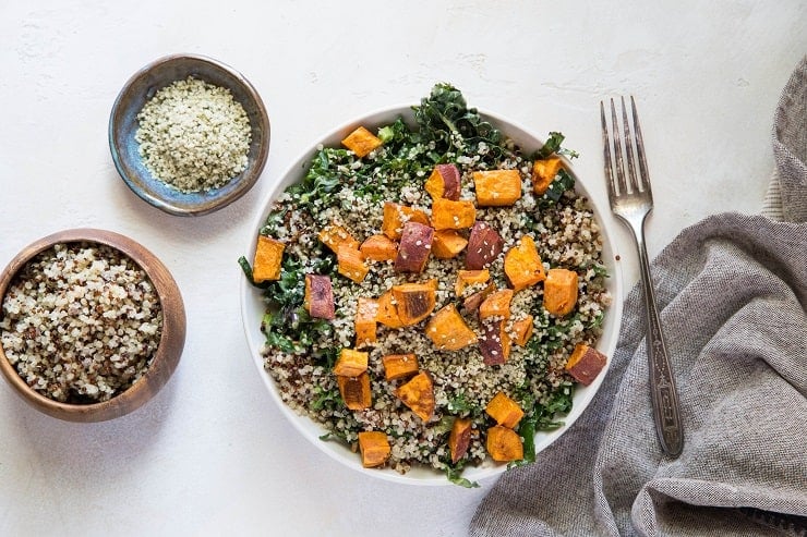 Roasted Sweet Potato Kale Salad with Quinoa, hemp seeds, and honey mustard dressing | TheRoastedRoot.net