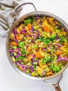 Spaghetti Squash Stir Fry with carrots, broccoli, cabbage, green onion, ginger, and coconut aminos - an easy paleo side dish | TheRoastedRoot.net #glutenfree