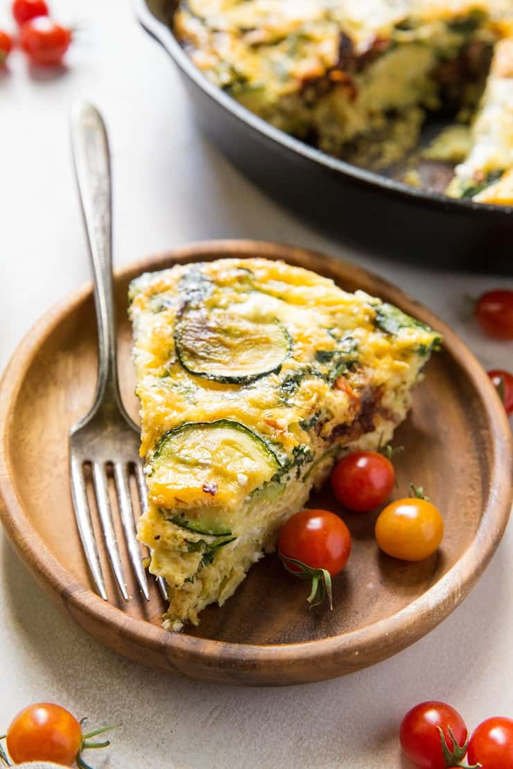 Spinach Frittata with Zucchini, Sun-Dried Tomatoes, and Goat Cheese - a healthy gluten-free breakfast recipe! | TheRoastedRoot.net