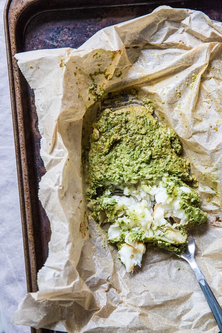 Fish en Papillote (fish in parchment paper) with Arugula-Pepita Sauce - a clean, healthy paleo whole30 keto dinner recipe | TheRoastedRoot.net