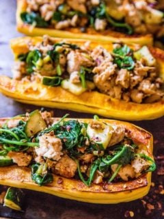 Ground Turkey Stuffed Delicata Squash with zucchini, spinach, ginger, and coconut aminos - paleo, whole30, keto, low-carb, and AIP dinner recipe! | TheRoastedRoot.net