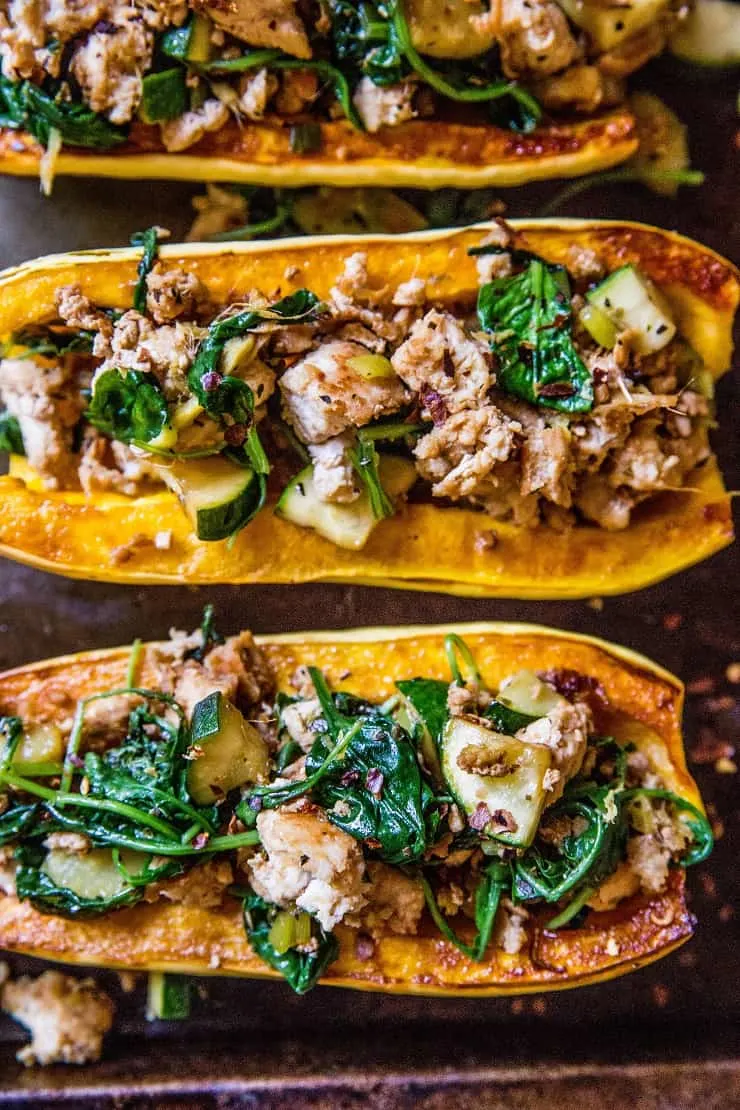 Ground Turkey Stuffed Delicata Squash with zucchini, spinach, ginger, and coconut aminos - paleo, whole30, Low-FODMAP, low-carb, and AIP dinner recipe! | TheRoastedRoot.net