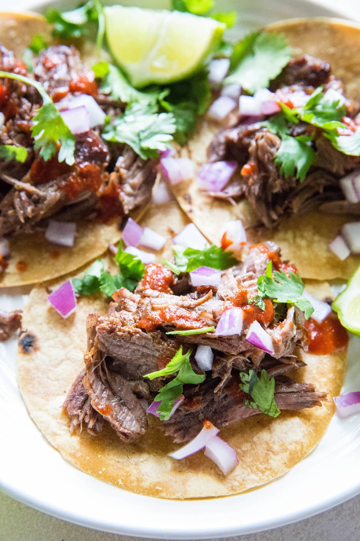 Pressure Cooker Shredded Beef - Mexican-style! An easy recipe for restaurant quality shredded beef | TheRoastedRoot.net