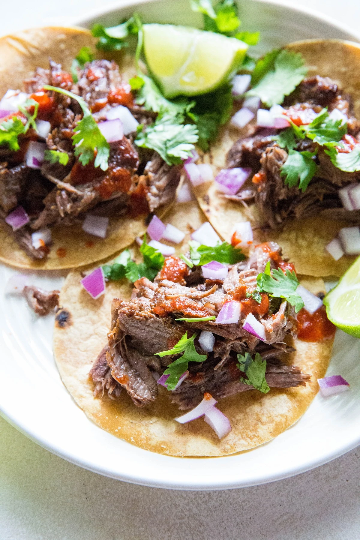 Instant Pot Shredded Beef - shredded beef made Mexican-style using a pressure cooker | TheRoastedRoot.net