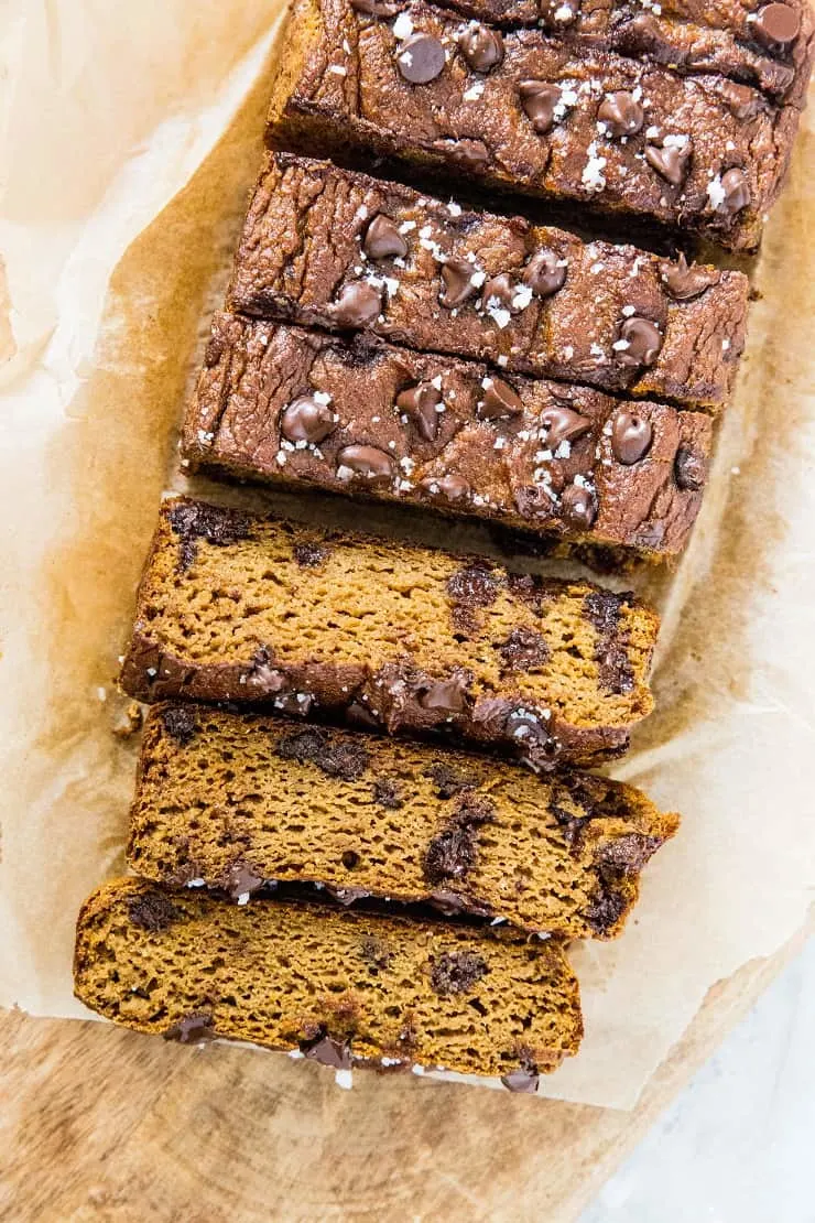 Grain-Free Pumpkin Bread with chocolate chips - a paleo pumpkin bread recipe made with coconut flour and pure maple syrup. Moist, fluffy, delicious! | TheRoastedRoot.net
