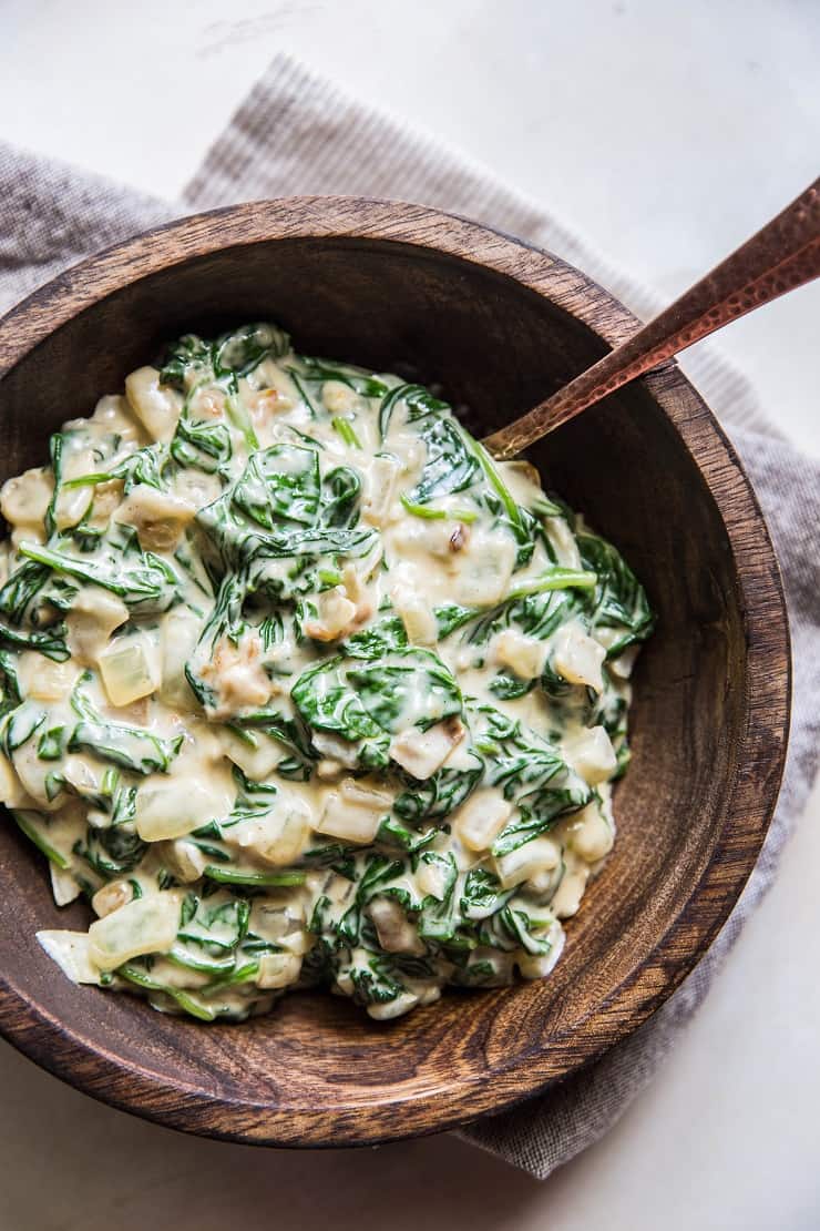 Dairy-Free Creamed Spinach with caramelized onions, garlic, and coconut milk - a healthy side dish! | TheRoastedRoot.net