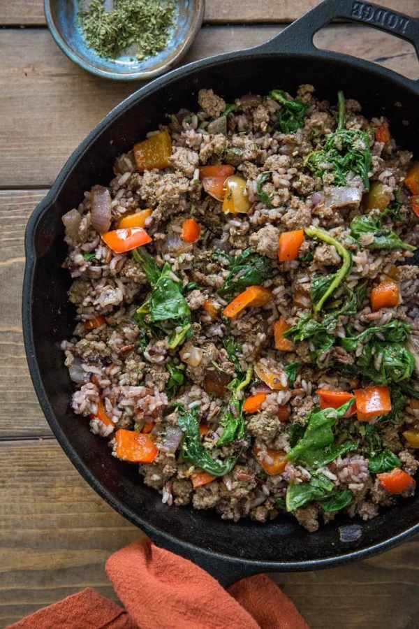 One-Skillet Ground Beef and Wild Rice with onion, garlic, rainbow chard, and bell pepper - an easy, quick well-balanced meal recipe ready in under 1 hour | TheRoastedRoot.net