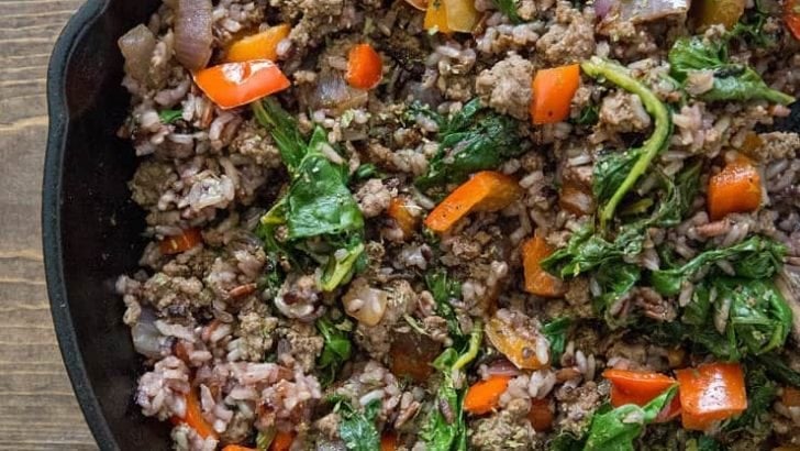 One-Skillet Ground Beef and Wild Rice with onion, garlic, rainbow chard, and bell pepper - an easy, quick well-balanced meal recipe ready in under 1 hour | TheRoastedRoot.net