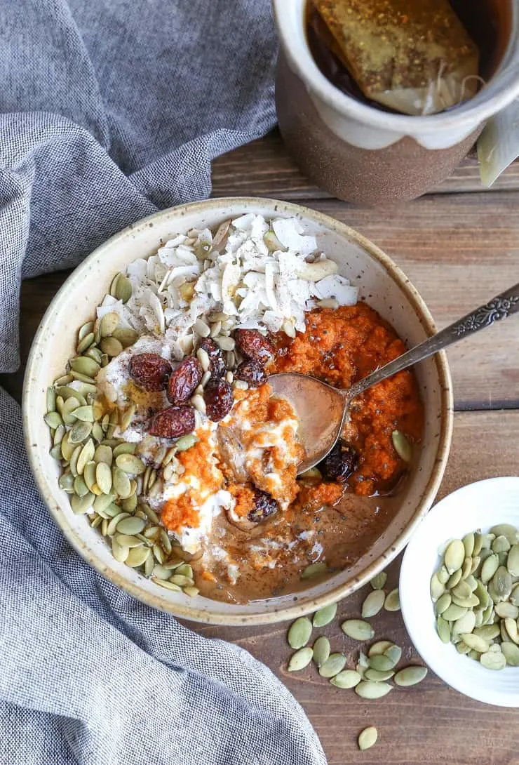 Roasted Pumpkin Breakfast Bowls - a delicious vegan and paleo breakfast recipe with almond butter, coconut yogurt, and pumpkin seeds | TheRoastedRoot.net