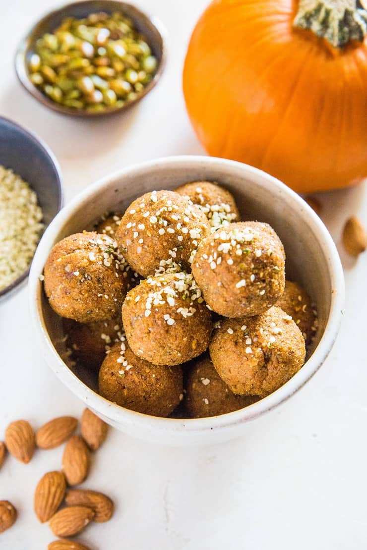 Pumpkin Spice Protein Balls - grain-free, refined sugar-free energy bites made with almonds, pumpkin seeds, dates, and more! | TheRoastedRoot.net