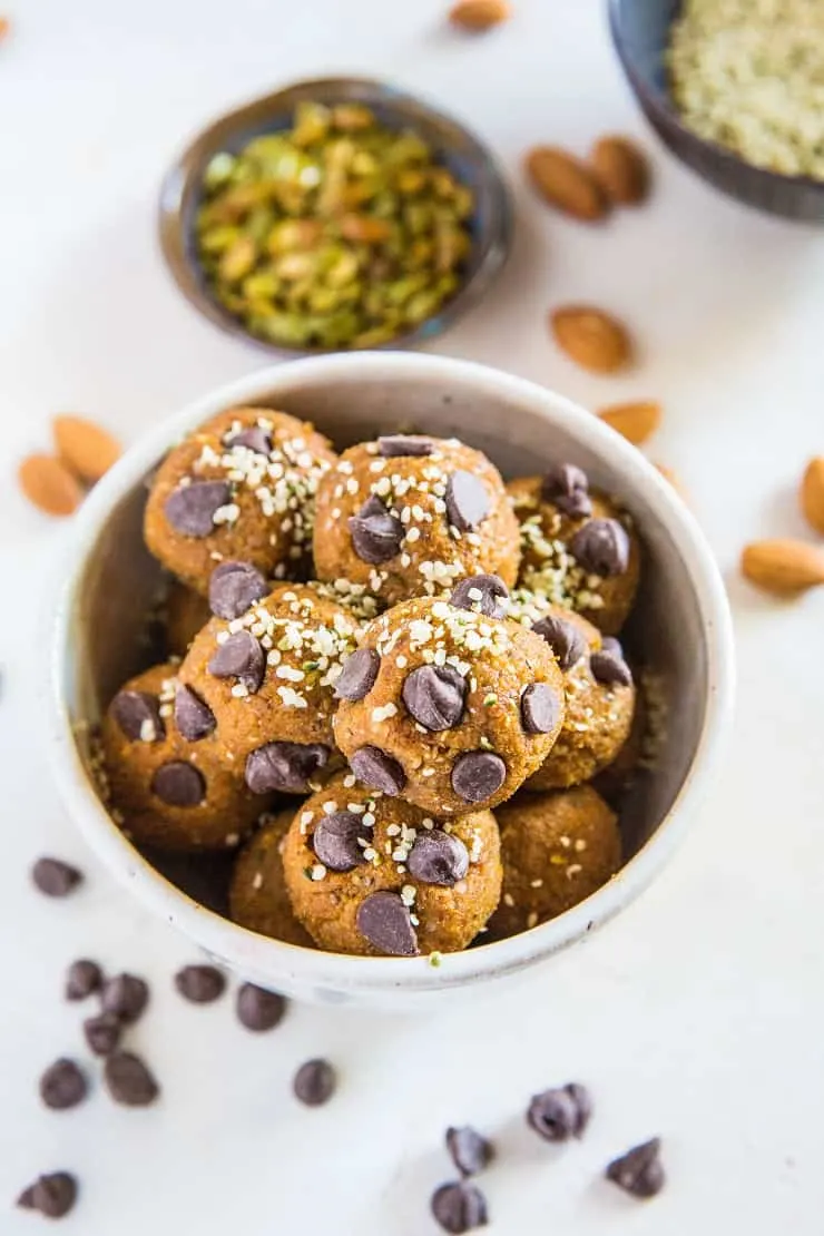 Pumpkin Spice Protein Balls - grain-free, refined sugar-free energy bites made with almonds, pumpkin seeds, dates, and more! | TheRoastedRoot.net