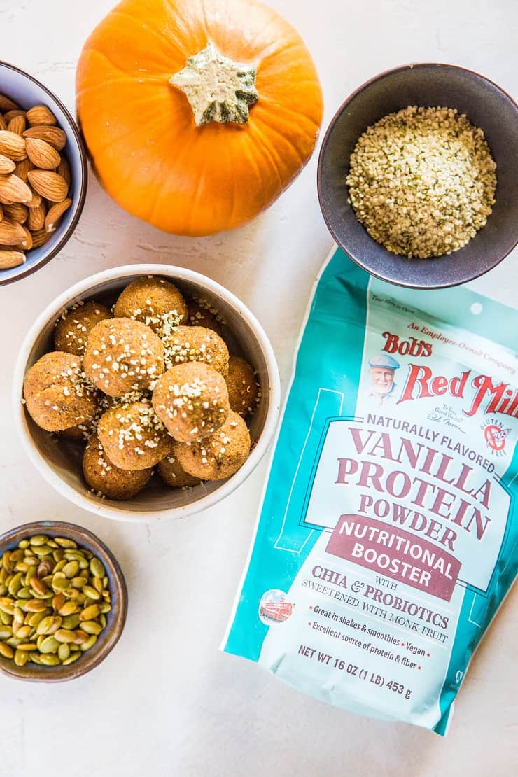 Pumpkin Spice Protein Balls made with nuts, seeds, dates, pumpkin, and protein powder for a healthy snack! | TheRoastedRoot.net