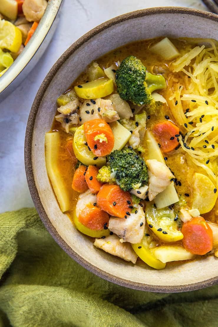 Bowl of Thai red curry served with spaghetti squash