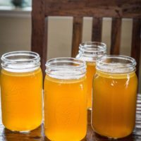 How to make turkey bone broth in your Instant Pot, slow cooker, or stove top. Use the bones from your Thanksgiving turkey to make bone broth!