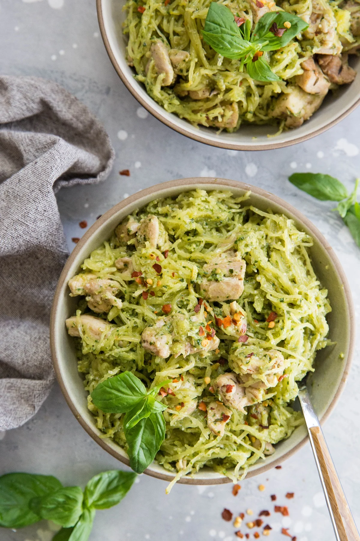 Chicken Pesto Spaghetti Squash - a clean dinner recipe that is paleo, keto, whole30 and easy to make | TheRoastedRoot.net #glutenfree #grainfree