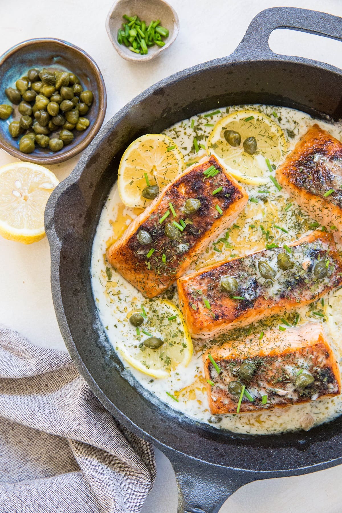 Crispy Salmon in creamy lemon dill caper sauce - dairy-free, Whole30, Keto, paleo, healthy dinner recipe!