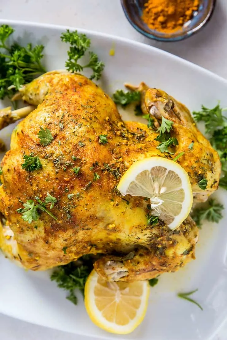 Instant Pot Turmeric Rotisserie Chicken - an easy whole chicken recipe made in the pressure cooker - fall-off-the-bone tender and delicious