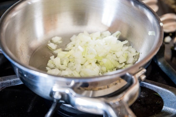 onion cooking in a saucepan