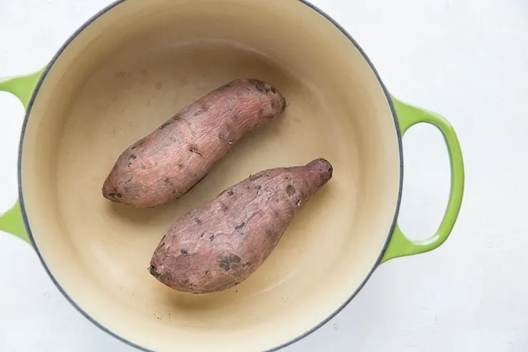 Boiled sweet potatoes in a pot