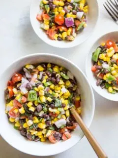 1 large and two small bowls of black bean corn salad