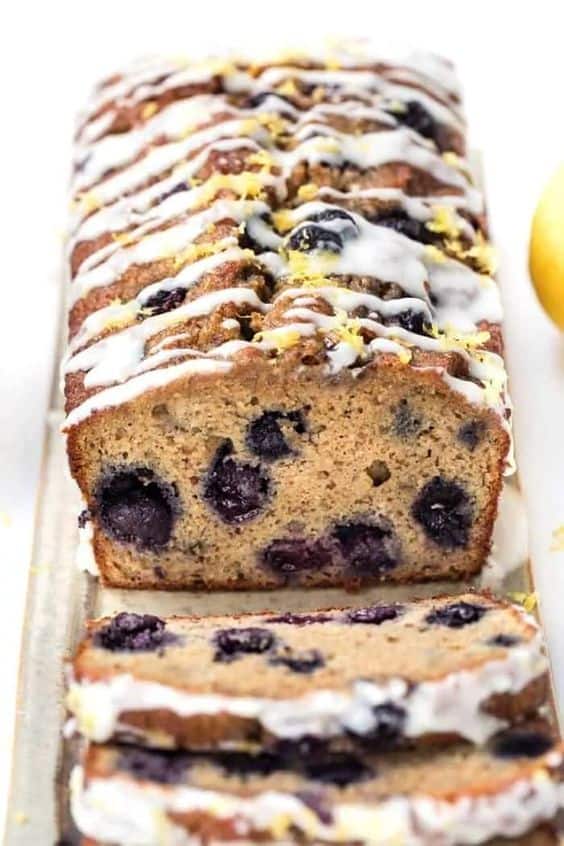 This healthy blueberry banana bread recipe is the perfect summer treat! Naturally gluten-free, sweetened without refined sugar and made with high protein flours.