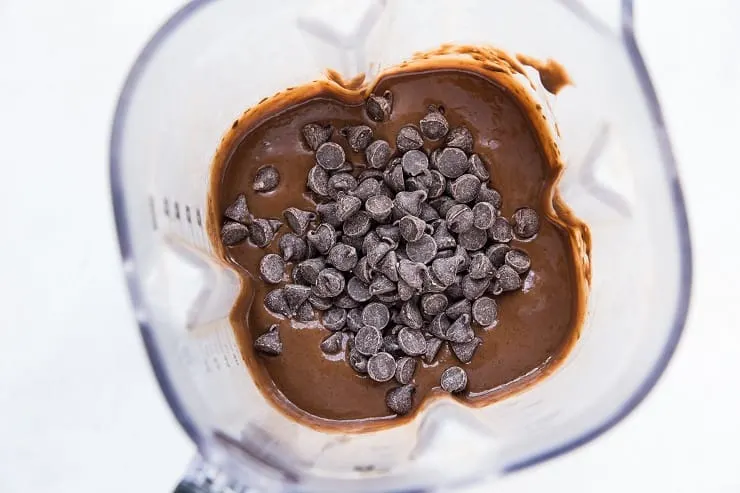 black bean banana bread batter in a blender with chocolate chips
