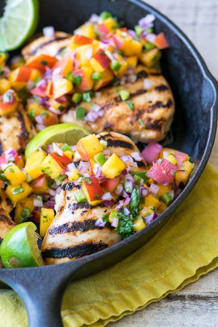 Grilled Chicken with Peach Jalapeño Salsa ~ this lightning quick meal is low calorie, low fat, low carb, gluten free, Whole 30 and Paleo compliant, not to mention Weight Watchers friendly. But more importantly, it’s healthy and insanely delicious.