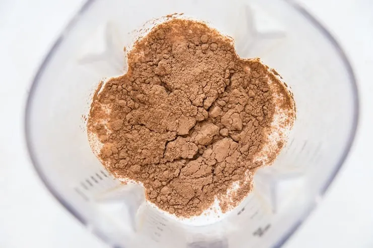 Ingredients for chocolate ice cream in a blender