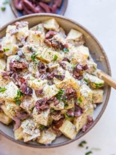Greek Potato Salad - a healthier potato salad recipe with cider vinaigrette, sun-dried tomatoes, kalamata olives, dill and parsley - an amazing side dish recipe for picnics and BBQs