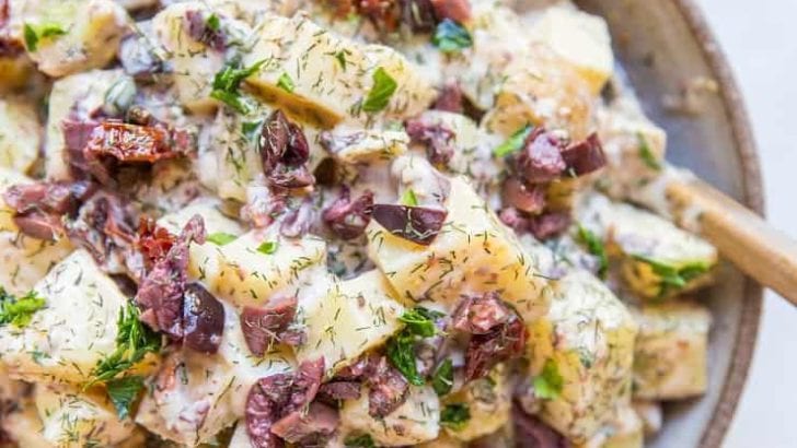 Greek Potato Salad - a healthier potato salad recipe with cider vinaigrette, sun-dried tomatoes, kalamata olives, dill and parsley - an amazing side dish recipe for picnics and BBQs