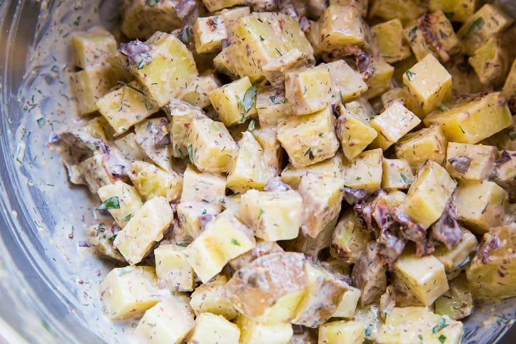 Greek Potato Salad in a mixing bowl