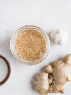 Top down photo of easy stir fry sauce with ginger and garlic next to the jar